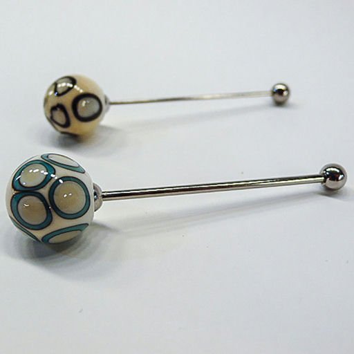 Design ball piercing earrings