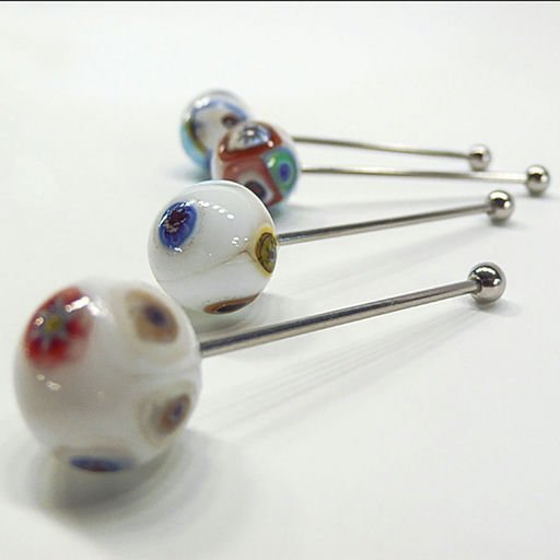 Design ball piercing earrings